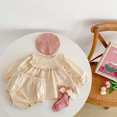 Dress your little one in adorable elegance with our Ruffle-Trim Puff Long Sleeve Dress & Short Set. This delightful ensemble features a stylish dress adorned with ruffle-trimmed puff sleeves, adding a touch of sophistication to her look. The coordinating shorts complete the outfit, offering comfort and versatility for all-day wear. Material: Cotton. Color: Pink, Beige. Puff Long Sleeve Dress, Puff Long Sleeves, Spring Baby, Long Sleeve Short Dress, Cotton Set, Short Set, Pink Beige, Dress Short, Cotton Lace