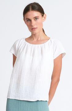 ~White~ Easy relaxed top with elasticized neckline that sits off-the-shoulder or on! Made from our airy Organic Double Gauze. Effortless and versatile, perfect for travel, day or night. Pair with our Nomad Pant or Daydream Skirt for a luxe matching set. 100% Organic Cotton Made in USA. Garment dyed extra soft and gets softer with wear! Length: "Colors: White, Wasabi, Desert Clay, Shadow Model is 5'8," size 4, and wearing a size small. Bust: 32"Waist: 24"Hips: 34" Desert Clay, Double Gauze, Small Bust, Matching Sets, White Undershirt, Shoulder Top, Off The Shoulder, Organic Cotton, Size 4