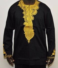 Handsome piece to walk into a party. High quality cotton with Gold embroidery on the chest. Long sleeves for the upcoming cold weather. Casual Long Sleeve Embroidered Shirt, Traditional Long Sleeve Shirt, Black Embroidered Long Sleeve Shirt, Traditional Black Long Sleeve Shirt, Traditional Long Sleeve Black Shirt, Gold Long Sleeve Cotton Shirt, Gold Long Sleeve Shirt For Fall, Traditional Long Sleeve Tops For Winter, Traditional Long Sleeve Winter Tops