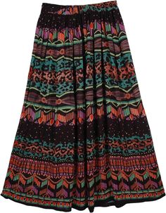 Printed Tribal Rayon Skirt - A flowy rayon skirt with a tribal inspired print. A full bodied print has a lot of color on this one from purple haze to teal and orange. The rayon material falls gracefully to create a casual relaxed look. The elastic waist is flexible and adjusts to your natural waist and sits there. The drawstring has tiny bells that jingle as you walk. Wear it with a sexy cami and flips flops and you`re in style with the village designer flair. Length: 35" ; Waist: 28"-34" (It ha Multicolor Boho Print Skirt For Festival, Multicolor Printed Long Skirt, Bohemian Rayon Skirt For Festival, Flowy Multicolor Printed Maxi Skirt, Bohemian Style Flowy Patterned Skirt, Flowy Multicolor Skirt With Elastic Waistband, Bohemian Multicolor Skirt With Elastic Waistband, Multicolor Boho Print Long Skirt, Multicolor Boho Print Skirt