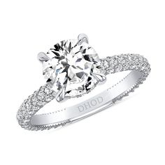 a white gold engagement ring with diamonds on it