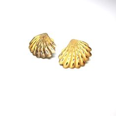 Vintage seashell earrings, gold toned finished.post back earrings. Sea shell jewelry, nautical.  Scallop shell earrings.Beach seaside jewelry, summertime bling.    Size of earrings:1" x .75" or 2.5 x 1.8 cm approxinatelyCondition:Fair.  A fair amount of wear on the front.  The finish is worn away a bit and tarnish on the underside. See photos above.  There are no back to the posts.  Would be lovely worn or re-purposed!You might like:http://www.etsy.com/listing/103610925/strawberry-purse-basket-c Gold Brass Shell-shaped Earrings, Gold Shell-shaped Brass Earrings, Gold Shell With Matching Earrings, Gold Brass Shell Earrings, Gold Shell Earrings For Summer, Shell-shaped Gold Shell Earrings, Gold Shell-shaped Shell Earrings, Gold Shell-shaped Earrings, Ocean-inspired Gold Shell Earrings