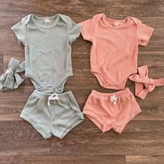 This ribbed baby set is perfect for summer. The top has button snaps to make easy changes. The shorts are cute and comfy with a drawstring. Cute Solid Color Summer Sets, Casual Ribbed Sets For Spring, Casual Ribbed Summer Sets, Cute Summer Loungewear Short Set, Solid Ribbed Summer Sets, Cute Matching Set Bottoms For Summer, Casual Solid Color Cotton Short Set, Solid Cotton Tops With Matching Set, Solid Color Summer Sets With Short Sleeves