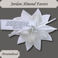 a white flower with the words jordan almond favors on it's side and an image of