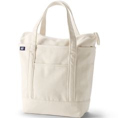 Life is easier when you have a roomy reliable bag. Something strong well-made and stylish will come in handy when you're heading to the library going to pilates class or running errands on the weekend. Enter the Lands' End Canvas Zip Top Tote Bag. Made from pure cotton this zippered bag will last through all of life's adventures. It can hold up to 500 pounds - we've tested it to make sure - so it can easily handle your everyday supplies. The water-repellent base and trim won't get soggy if you s Lands End Tote, Plus Fours, Zippered Bag, Clothing Details, Fabric Tape, Kids Luggage, Small Tote, Travel Tote, Open Top