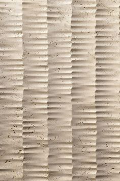 the texture of sand is made up of vertical lines and curves in varying sizes, including horizontals