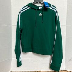 Closet Clean Out!!! Adidas Women’s Cropped Hoodie Nwt Size Small No Pockets Drawstring Adjustable Hoodie Color Green With White Stripes Retail $60 Cleaning Out My Daughters Closet Lots Of Items Will Be Posted Soon. Adidas Sportswear Hoodie With Ribbed Cuffs, Adidas Sportswear Sweatshirt With Drawstring Hood, Adidas Athleisure Hoodie With Ribbed Cuffs, Adidas Green Sportswear Top, Green Sporty Hoodie With Ribbed Cuffs, Adidas Sportswear Hoodie With Three Stripes, Adidas Athleisure Hoodie With Crew Neck, Adidas Three Stripes Hoodie Sweatshirt, Adidas Hoodie Sweatshirt With Three Stripes