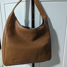 Brand New Unused Caramel Medium Deadstock Leather Bag Luxury Brown Hobo Bag For Shopping, Classic Brown Bucket Bag With Double Handle, Dark Tan Leather Crossbody Shoulder Bag, Dark Tan Leather Satchel Shoulder Bag, Dark Tan Leather Shoulder Bag, Luxury Brown Rectangular Hobo Bag, Luxury Brown Smooth Grain Bucket Bag, Formal Brown Leather Hobo Bag, Classic Brown Top Handle Hobo Bag