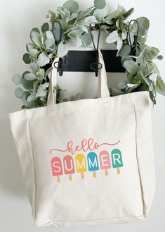 This "Hello Summer" tote bag is perfect for taking to the beach or pool. Made from a heavy weight poly linen they are substantial enough to pack all the supplies you might need. And of course, these bags are environmentally friendly - they're large and durable enough to be used again and again for pool gear, books, groceries, essentials for the beach and much, much more. Designs are printed directly onto the fabric with high pigment inks to produce vibrant colors. BAG DETAILS: HEAVY WEIGHT FAUX Large Capacity Summer Canvas Bag, Large Capacity Canvas Bag For Summer, Summer Weekend Cotton Beach Bag, Everyday Summer Cotton Beach Bag, Cotton Summer Beach Bag, Summer Canvas Bag With Large Capacity, Fun White Tote Beach Bag, Summer Large Capacity Cotton Canvas Bag, Summer Weekend Cotton Bags