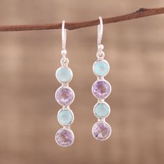 Circles of blue chalcedony and purple amethyst total five carats, creating a trendy look in this pair of dangle earrings from India. Neetu Barathi designs the earrings, framing the gemstones with sterling silver. Blue Chalcedony Earrings, Chalcedony Earrings, Blue Chalcedony, Hook Earrings, Jewelry Gift Box, Purple Amethyst, Free Jewelry, Sterling Silver Earrings, Sterling Silver Jewelry