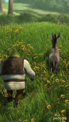 an animated image of two people walking through the grass