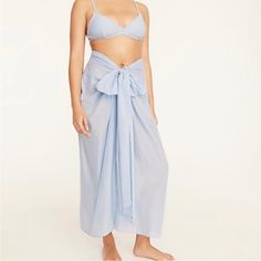 New J Crew Women's Cotton Convertible Beach Sarong Blue Size Large This Can Be Worn Three Different Ways: Tied At The Waist As A Skirt, Tied At The Chest As A Bandeau Dress Or Tied Around The Neck As A Halter. This Style Is Made With 100% Organic Cotton. Length Is 37” Blue Breezy Summer Cover-up, Chic Blue Swimwear For Beach Cover-up, Casual Wrap Sarong For Vacation, Chic Blue Beach Cover-up, Summer Vacation Tie Waist Sarong, Chic Blue Cover-up For Vacation, Casual Blue Cover-up For Resort Season, Beachy Sarong For Summer Day Out, Beachy Summer Sarong For Day Out