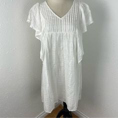 World Market White Cotton Flutter Sleeve Dress S/M Nwt V-Neck Flutter Sleeves Lined Light Gauzy Material Approximate Flat Measurements Pit To Pit 20” Length 35” J13 Casual Flowy V-neck Dress With Flutter Sleeves, Flowy V-neck Dress With Flutter Sleeves For Brunch, White Flowy V-neck Dress For Summer, White Split Neck Casual Dress, White Casual Dress With Split Neck, White Casual V-neck Dress With Split Neck, Flowy V-neck Dress With Flutter Sleeves, White Flowy V-neck Dress For Brunch, Flowy White V-neck Dress For Brunch