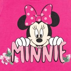 a minnie mouse shirt with the word minnie on it's chest and a pink bow