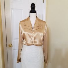 Honey Gold Yellow Satin Button Down Long Sleeve Blouse By Dressbarn In Nwot Condition. Size 14/16w Annequin Is Size S. See The Pictures. Elegant Dressy Or Casual Blouse With Double Layered V Neck Collar. Approximate Measurements Flat Long From Neck To Hem 28" Chest - 23" Wide At Hem - 24" Sleeve - 24" Sleeve Opening - 4" In Nwot Condition - No Signs Of Wear. Classic Gold Formal Blouse, Elegant Collared Blouse With Buttons, Classic Fitted Gold Blouse, Elegant Gold Blouse For Workwear, Elegant Gold Blouse For Work, Gold Blouse With Buttons For Work, Gold Button-up Blouse For Work, Elegant Gold Collared Blouse, Spring Gold Blouse With Buttons