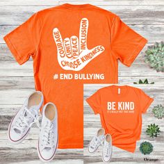 Take a stand against bullying with this empowering "End Bullying" T-shirt. Designed to spread awareness and promote kindness, this tee is a powerful statement for change. This classic unisex jersey short sleeve tee fits like a well-loved favorite. Soft cotton and quality print make users fall in love with it over and over again.  .: 100% Airlume combed, and ring spun cotton (fiber content may vary for different colors) .: Light fabric (4.2 oz/yd² (142 g/m .: Retail fit .: Tear away label .: Runs Casual Pre-shrunk T-shirt For Awareness Events, Empowering Short Sleeve T-shirt With Text Print, Pre-shrunk Short Sleeve T-shirt For Awareness Events, Casual Graphic T-shirt For Awareness Events, Casual Graphic Print T-shirt For Awareness Events, Casual T-shirt With Graphic Print For Awareness Events, Casual Crew Neck Shirt For Awareness Events, Casual Cotton Shirt For Awareness Events, Unity Day