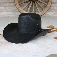 Step into the Western spirit with the Twister Casual Hat by M & F Western Products. This ruggedly durable hat showcases a sleek black design complemented by a 2-cord black band. Designed for both style and functionality, it features eyelets for added breathability, ensuring comfort throughout the day. Brim: 4" Crown: 4-1/4" Color - Black Straw Material - 100% Paper Adjustable Black Hat For Rodeo, Adjustable Black Hat Band For Rodeo, Black Flat Bill Hat For Ranch, Black Western Hat For Outdoor, Adjustable Black Hat Bands For Western-themed Events, Black Adjustable Hat Band For Western-themed Events, Western Style Adjustable Black Hat, Adjustable Solid Color Country Hat Band, Black Western Hat Bands With Flat Bill