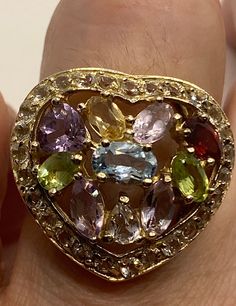 Lovely and delicate Bohemian ring 925 Sterling silver Deco ring set with genuine citrine, amethyst blue topaz and peridot Size 5 but can be re sized for you on request by laser. My jeweler charges $10-$20 All rings are shipped in a nice gift box. Check out our over a THOUSAND great reviews Engraving is $4 per letter and is not always perfect depending on the piece. It can take a few days if the jeweler is busy. This is payable to Paypal Judithsltd@gmail.com Multi-stone Ring Gemstones For Gift, Heart-shaped Topaz Ring For Gift, Heart-shaped Topaz Gemstone Ring For Gifts, Dazzling Topaz Ring With Gemstone Accents As Gift, Elegant Multicolor Amethyst Ring For Anniversary, Multicolor Heart Cut Multi-stone Jewelry, Fine Multi-stone Heart-shaped Jewelry, Fine Jewelry Heart Shaped Multi-stone, Fine Jewelry Heart Cut Multi-stone Rings