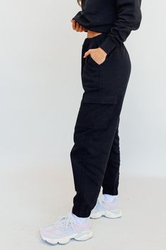 Introducing our exclusive limited-edition women's oversized cargo sweatpants. Crafted from high-quality materials, these sets redefine comfort and style. Available in sizes XS to 2X, find your perfect fit with regular or tall lengths for the bottoms. Embrace the freedom of movement and comfy chic with our meticulously designed, oversized fits. Elevate your loungewear game. Shop now before they're gone. -High rise -Heavyweight fleece fabric -Oversized silhouette -Elastic waistband -Interior draws