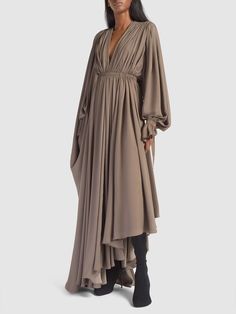 Asymmetrical draped panels Elegant Draped Asymmetrical Fall Dress, Elegant Asymmetrical Draped Dress For Fall, Elegant Draped Asymmetrical Dress For Fall, Draped Asymmetrical Evening Dress For Fall, Elegant Fall Dress With Handkerchief Hem, Elegant Handkerchief Hem Fall Dress, Silk Dress With Draped Sleeves And Asymmetrical Hem, Silk Asymmetrical Dress With Draped Sleeves, Asymmetrical Maxi Dress With Draped Sleeves