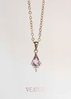 ITEM DESCRIPTION Our Kite Amethyst Necklace feature a custom-cut, natural Amethyst Gemstone custom cut in a Kite shape. Handmade with thick Gold Vermeil on a solid sterling silver base and finished with our proprietary anti-tarnish coat, which helps maintain the precious gold plating even with regular wear and tear. This collection is characterized by an edgy yet understated elegance. It embodies a blend of softness and strength. Explore our entire Kite Collection with earrings, rings, and necklaces. DETAILS * Gemstone - Natural Amethyst custom cut in kite shape, cz side stones * Total Pendant Length - 1 inch approx. with bail * Material - 925 sterling silver base, 18k thick gold plating over sterling silver, known as gold vermeil (nickel-free) with anti-tarnish coat * Chain is a sparkly f Sparkly Flats, Custom Jewelry Box, Chain Extenders, February Birthstone, Earrings Rings, Amethyst Necklace, Understated Elegance, February Birth Stone, Holiday Birthday