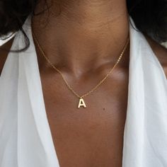 P R O D U C T I N F O R M A T I O N  ⭐Material Quality » Crafted from high-quality 925 sterling silver and gold-plated, this stainless steel women's chain offers durability and lasting shine. The stainless steel chain for women guarantees skin-friendliness and comfort, ideal for daily wear. Our gold letter necklace is sturdy and features a lobster clasp closure. Our women's gold chain is waterproof. The initial necklace features the letter "A".  ⭐Unique Pendant » The letter pendant with the lett Simple Gold Sterling Silver Initial Necklace, Simple Gold-toned Sterling Silver Initial Necklace, Simple Gold-colored Sterling Silver Initial Necklace, Minimalist Tan Charm Necklace As Gift, Gold Hypoallergenic Initial Pendant Jewelry, Tan Initial Pendant Charm Necklace As Gift, Tan Initials Charm Necklace Gift, Hypoallergenic Gold Initial Pendant Jewelry, Tan Charm Necklace With Initials For Gift