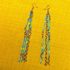 Handcrafted Beaded Gold Tone Blue Yellow Long Earrings 5.5” Long Super Fun Dangly One Of A Kind Perfect For Any Get Away Vacation Summer Festival. Can Be Customized And Made In Any Color Or Length For You Models Are Similar Earrings, Not The Same. Blue Large Beads Dangle Earrings, Blue Large Beaded Dangle Earrings, Blue Earrings With Gold Beads, Blue Beaded Earrings With Dangling Round Beads, Blue Round Beaded Earrings For Beach, Blue Beaded Earrings For Beach, Colorful Blue Beaded Earrings For Beach, Blue Large Beads Earrings For Beach, Blue Large Beaded Earrings For Beach