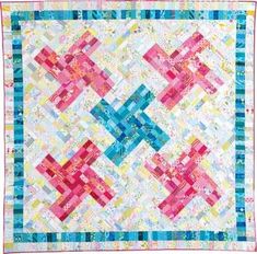 a colorful quilt with squares on it