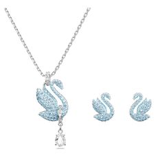 This graceful Swan set is the perfect combination to ignite your style. Including pierced stud earrings and a long pendant, each radiant piece features an all-over pavé of ice blue crystals. A single pear-shaped stone hangs beneath the pendant for added luxury. This set is an ideal gift for a loved one who adores vivid color in their style. Swan Necklace, Swarovski Swan, Expensive Jewelry Luxury, Expensive Gifts, Jewelry Accessories Ideas, Swarovski Necklace, Expensive Jewelry, Bracelet Cuir, Jewelry Lookbook