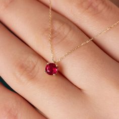 "Our 14k solid gold ruby necklace is a stylish jewel for you and your loved ones with its elegant design. Time to pamper yourself and your loved ones... 🤍🤍 Special gifts for your special moments. We produce our jewelery for you in the most perfect way. 🤍🤍 All of our products are made of 14K Solid gold. FEATURES * Made to order. * Gold Color Selection: Yellow Gold, Rose Gold, White Gold * Gold KT: 14K * Length: 14\", 16\", 18\", 20\", 22\",24\" * Ruby Carat: 0.50 ct. * Pendant Height: 6,00 mm Red 14k Gold Birthstone Necklace, Minimalist Ruby Birthstone Necklace, Elegant 14k Gold Birthstone Necklace For Valentine's Day, Red Birthstone Necklace In 14k Gold, Red 14k Gold Birthstone Necklace With Round Pendant, Red 14k Gold Round Pendant Birthstone Necklace, Gift Necklace With Prong Setting And Lab-created Ruby, Ruby Necklace With Prong Setting As Gift, Gold Ruby Necklace