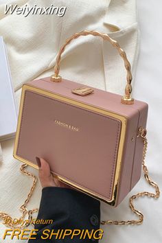 Shipping: Worldwide Express Shipping AvailableDelivery time: 🚚7-15Days Fast ShippingReturns: Fast refund,💯100% Money Back Guarantee.Brand Name: XZANHandbags Type: Shoulder BagsTypes of bags: Shoulder & Crossbody BagsMain Material: PULining Material: PolyesterShape: BoxPlace Of Origin: HE BEI ProvincePlace Of Origin: HE BEI ProvinceOrigin: Mainland ChinaHardness: HARDPattern Type: SolidInterior: No PocketDecoration: ChainsDecoration: short metal handleExterior: NONEOccasion: VersatileClosure Ty Trendy Rectangular Travel Box Bag, Portable Rectangular Shoulder Bag For Daily Use, Portable Rectangular Bag For Gifts, Chic Portable Box Bag For Travel, Rectangular Portable Box Bag For Daily Use, Portable Pink Square Bag, Rectangular Gift Bag, Trendy Portable Rectangular Shoulder Bag, Large Capacity Top Handle Box Bag As Gift