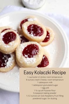 the recipe for easy kolacicki is displayed on a plate with powdered sugar