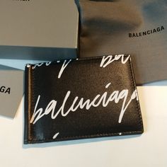 Nwot Balenciaga Cardholder/Wallet Black And White Comes With Box And Dust Bag Designer Rectangular Wallets With Logo, Designer Bifold Card Holder For Daily Use, Designer Rectangular Card Holder With Logo, Elegant Rectangular Logo Card Holder, White Bifold Card Holder With Interior Slots, Designer Wallets With Card Slots For Everyday Use, Luxury White Wallet, Designer Logo Card Holder For Business, Designer Business Card Holder With Logo