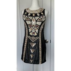 I Am So In Love With This Gorgeous Nwt Needle & Thread Dress In Size 6! Includes The Beading That Needle & Thread Is So Well Known For, But Also Includes Jewels And Mirrored Details All Over The Front Of The Dress. Geometric Shapes Make This Dress Stand Out, You Will Not Be Lost In The Crowd In This One! This Style Is Perfect For Special Events. The Dress Does Have One Minor Flaw As Depicted, There Are A Couple Of Sequins Missing At The Zipper Line (Approx. 3) But This Should Not Be Noticeable W Needle And Thread Dresses, Thread Dress, Black Grey Ombre, Dress Geometric, Flowy Mini Dress, Dress Stand, Blouson Dress, Needle Thread, Eyelet Dress