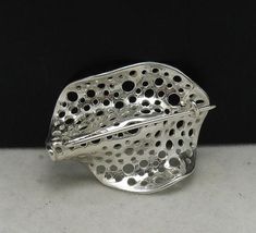 Sterling silver brooch - Extravagant 925/1000. Stamped 925. Approximate weight 5.6 grams. Dimensions 3.0x3.9cm. All our jewels are made from solid sterling silver 925/1000 and are carefully crafted by hand in our family workshop. We dispatch your orders in 5 working days, worldwide and the postage is $5. We ship registered priority mail. Please allow 5-7 working days for delivery in Europe and 10-15 working days outside Europe. For any questions - please do not hesitate to contact me! Unique Sterling Silver Brooch In Silver, Formal Hallmarked Silver Brooches, Formal Silver Hallmarked Brooches, White Gold Sterling Silver Brooches For Wedding, Wedding Brooches In White Gold And Sterling Silver, White Gold Sterling Silver Wedding Brooches, Formal Silver Hallmarked Brooch, Hallmarked Sterling Silver Brooches For Anniversary, Sterling Silver Hallmarked Brooches For Anniversary