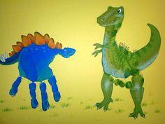 an image of two dinosaurs painted on the wall