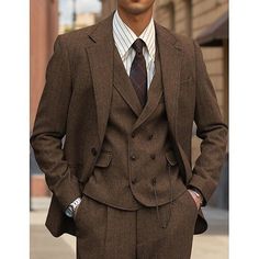 Tuxedo Action® Offers Quality Tux, Prom Suits, Wedding Suits, Etc. Get a Discount Now. Find Your Ideal Tuxedo Suits Here. View Our Collections for All Formal Venues and Seasons. #suits, #single jackets, #2-piece suits, #3-piece suits, #slim-fit #tuxedo, and #double-breasted #tuxedos. Tuxedo Action has costumes suitable for #wedding, #Dinnerparty, #Prom, #Stages #Party Vintage Mens Suits Wedding, Brown And Black Tuxedo, 1920 Suits Men, Tweed Herringbone Suit, Suit Vests Men, Old School Groomsmen Attire, Dark Brown Suits For Men, Mens Tweed Suit Vintage, Herringbone Suit Men