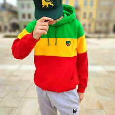 This classic thick and fleshy hoodie made from high-quality brushed fabric, consisting of: 90% cotton, 10% polyester. The hoodie features a tricolor block pattern in Rasta / Reggae colors, creating a unique and original style. The hood has metal eyelets at the drawstring, and a embroidered Lion of Judah applique on the left chest. The side seam label is designed in Rastafari style. This product is made of the highest quality cotton yarn, and certified by Oeko Tex Standard 100 and the Internation Sporty Cotton Sweatshirt With Color Matching, Contrast Color Crew Neck Hoodie For Streetwear, Casual Multicolor Hoodie With Color Matching, Cotton Color Block Hooded Sweatshirt, Urban Multicolor Hooded Hoodie, Multicolor Hoodie Sweatshirt With Kangaroo Pocket, Hooded Color Block Fleece Sweatshirt, Urban Style Multicolor Hoodie Sweatshirt, Color Block Hooded Fleece Sweatshirt