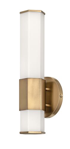 a white and gold wall light on a white background with no one in the photo