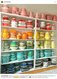 the shelves are filled with colorful bowls and plates