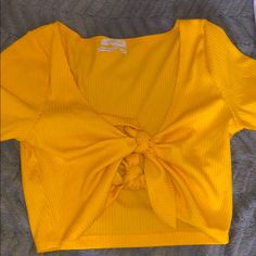 Never Worn! Yellow Urban Outfitters Top For Spring, Urban Outfitters Yellow Tops For Spring, Yellow Crop Top For Day Out, Yellow V-neck Crop Top For Day Out, Yellow Urban Outfitters Crop Top, Yellow Urban Outfitters Crop Top For Summer, Urban Outfitters Yellow Crop Top For Summer, Urban Outfitters Yellow Crop Top For Spring, Trendy Yellow Crop Top For Spring