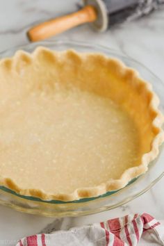 an uncooked pie crust in a glass bowl