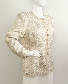 This is a stunning ivory and gold jacket from Lillie Rubin.  It is fully lined and has shoulder pads.  Closes down the front with rhinestone buttons and inner snaps.  The jacket has beautiful ivory trim.  The metallic gold thread and the textured pattern really add to the elegance of this piece.  Size tag 10, made in USA.   Measurements taken with jacket laying flat and doubled where appropriate. In order to determine fit we recommend comparing measurements with an item that fits you well. Lengt New Look Patterns, Brown Spots On Face, Gold Jacket, Wedding Jacket, Textured Jacket, Sailor Dress, Evening Jackets, Gold Thread, Jacket Long