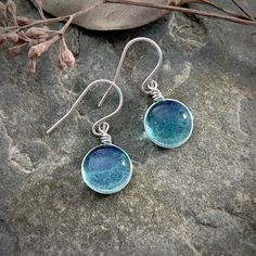 "Medium Size Blue Raindrop Earrings, Boho Silver Aesthetic Earrings, Simple Hippie Earrings, Light Blue Minimalist Nature Lover Gift, Best Friend Gift This collection is inspired by the beauty of rain and the rainbow of colors seen in nature. This is the perfect gift for anyone that loves nature, simplicity, and a customizable look! The sparkle is subtle and simple and changes depending on the lighting and the colors behind the glass. This wanderlust, boho, hippie style earrings are the perfect Minimalist Teardrop Glass Jewelry, Minimalist Glass Dangle Jewelry, Everyday Round Glass Jewelry, Everyday Glass Drop Earrings, Minimalist Glass Drop Earrings, Minimalist Glass Dangle Earrings, Nickel Free Glass Jewelry In Minimalist Style, Minimalist Nickel-free Glass Jewelry, Minimalist Glass Jewelry With Ear Wire