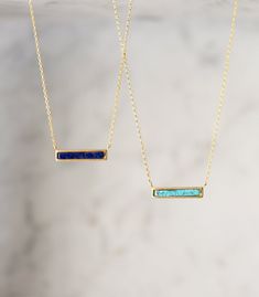 MATERIALS & MEASUREMENTS: - 14K Gold Plated - Natural Stone: Turquoise or Blue Lapis - Pendant Height 3/16 in, Width 7/8 in, chain Length 18 in - Lobster clasp - Hypoallergenic, lead & nickel free - Handcrafted in NYC NECKLACE SOLD SEPARATELY To shop more Pendant Necklaces: https://www.etsy.com/shop/AccessoriesAtelier?ref=shop_sugg&section_id=24595051 Blue Rectangular Pendant Birthstone Jewelry, Dainty Blue Turquoise Necklace As A Gift, Blue Birthstone Rectangular Pendant Necklace, Blue Birthstone Necklace With Rectangular Pendant, Blue Rectangular Birthstone Necklace, Blue Minimalist Rectangular Pendant Jewelry, Dainty Blue Turquoise Pendant Necklace, Minimalist Blue Turquoise Gemstone Necklace, Dainty Blue Turquoise Necklace With Adjustable Chain