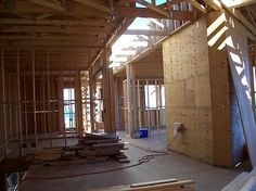 the inside of a house being built with wood framing