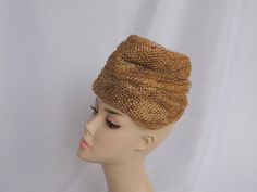 Please measure your head prior to ordering this hat to be sure it will fit. There are no returns. Fun turban style hat made of gold mesh with gold glitter scattered throughout the hat. The hat is lined with a peach colored woven grosgrain ribbon. I also have a matching pair of gold gloves for sale. No brand name label. Interior circumference measures 20". Very clean with no holes or soiling. Excellent Condition Formal Hat, Easter Hat, Gold Gloves, Easter Hats, Church Hat, Dress Hat, Turban Style, Turban Hat, Church Hats