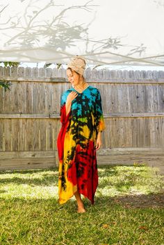 "Add a touch of unique style to your wardrobe with our Hand-Dyed Kaftan Dress! This stunning dress is made from 100% breathable and comfy rayon fabric, ensuring maximum comfort all day long. Using our unique method, each dress is carefully hand dyed, resulting in a one-of-a- kind masterpiece. The intricate patterns and vibrant colors make this dress a true work of art. The kaftan dress comes in a versatile one size fits most (S-3XL), making it extremely comfortable for a wide range of body types. With a bust measurement of up to 60\", you can feel confident that this dress will flatter your figure. The dress measures 55\" in length and 45\" in width, providing a loose and flowing fit that is both stylish and flattering. Featuring a trendy V-neck design and side slits, this slipover style d Casual Hand Dyed Maxi Dress For Festivals, Bohemian Multicolor Dresses With Natural Dye, Casual Hand Dyed Festival Maxi Dress, Hand Dyed Multicolor Dress For Festival, Multicolor Hand Dyed Bohemian Dress, Hand Dyed Multicolor Dresses For Festival, Casual Hand-dyed Maxi Dress For Festivals, Bohemian Long Sleeve Tie Dye Dress, Beach Hand-dyed Multicolor Dresses