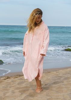 The Powder pink linen dress women is our favorite weekender. this Plus size maxi dress featuring an oversized relaxed fit with a front button closing. The womens long sleeve shirt dress is made from 100% linen, that is versatile for any occasion! This linen clothing is designed to be comfortable and not troublesome to wear.  After wearing this sustainable clothing for women, you will love it even more. This Oversized shirt dress is designed to flatter every body type and fit numerous occasions. Beach Maxi Dress With Pockets And Long Sleeves, Pink Relaxed Fit Midi Dress For Summer, Linen Maxi Dresses For Loungewear, Oversized Long Sleeve Linen Dress For Vacation, Pink Linen Beach Dress, Pink Dresses With Pockets And Relaxed Fit, Pink Maxi Dress With Pockets, Summer Linen Maxi Dress With Long Sleeves, Casual Pink Linen Vacation Dress