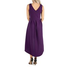 This party ready dress has everything you could wish for. A stylish fit n flare dress featuring a bold high low hemline, v neckline, sleeveless design, and pockets for a finishing touch. With its modern twist on the classic party dress this style is perfect for a wedding guest look or any special occasion. Made from a soft comfortable stretch material. Available in three year round colors and machine washable for easy care. Classic Party Dress, Classic Party, Wedding Guest Looks, Comfort Color, Fit N Flare Dress, Purple Dress, Flare Dress, Wedding Guest, Fit And Flare